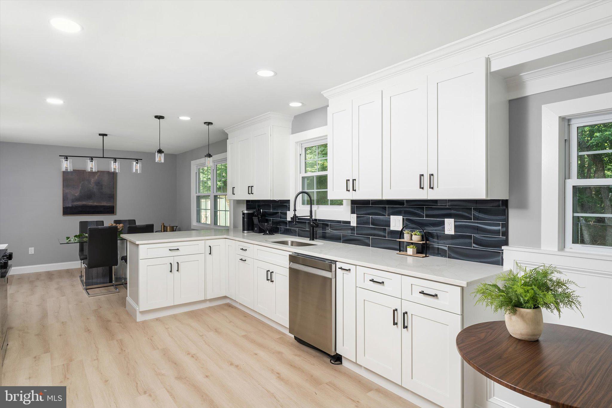 2 Tall Timber Lane Burlington, NJ 08016 - Photo 12 of 30 a kitchen with a white cabinets and stove