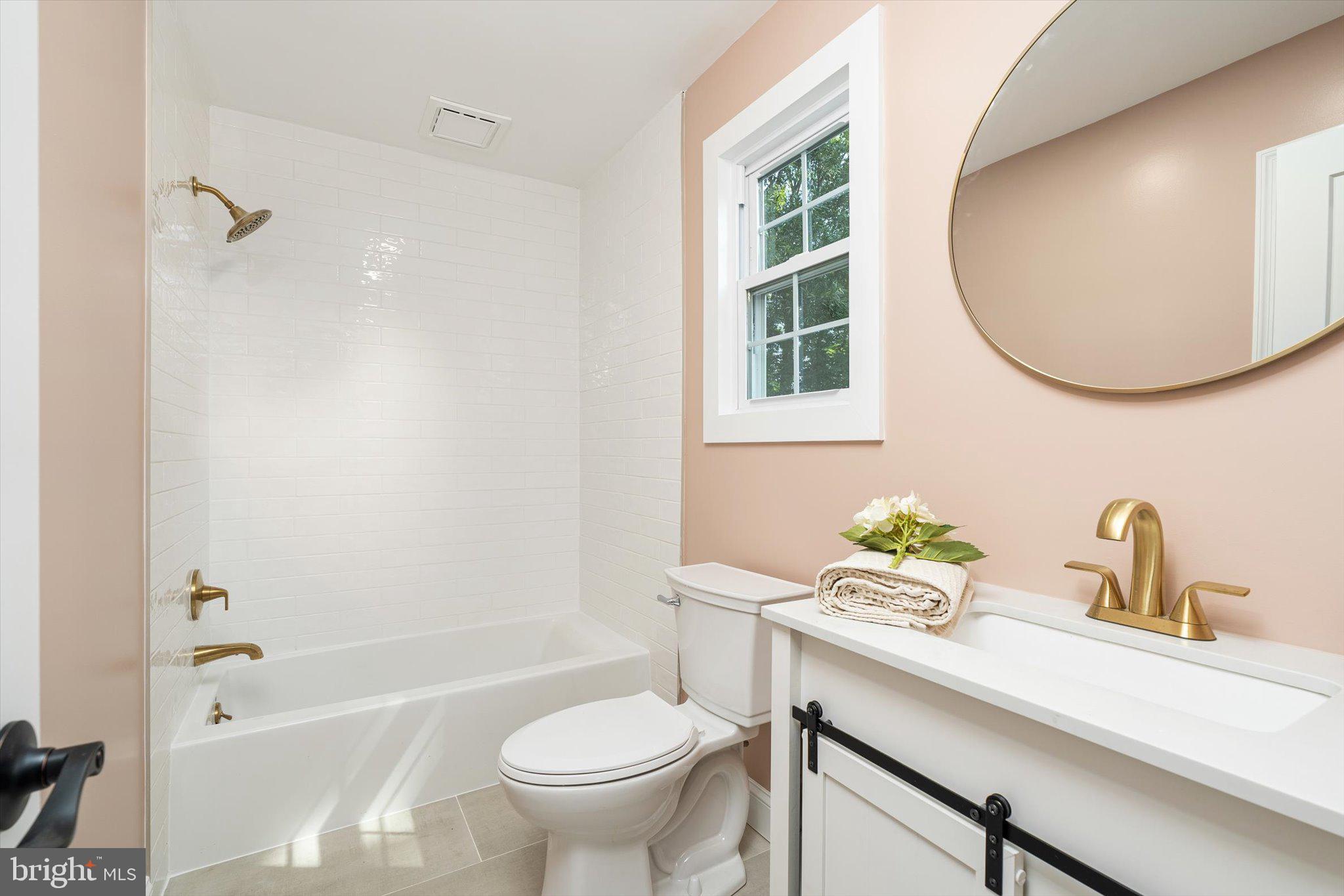 2 Tall Timber Lane Burlington, NJ 08016 - Photo 21 of 30 a bathroom with a sink a toilet and a mirror
