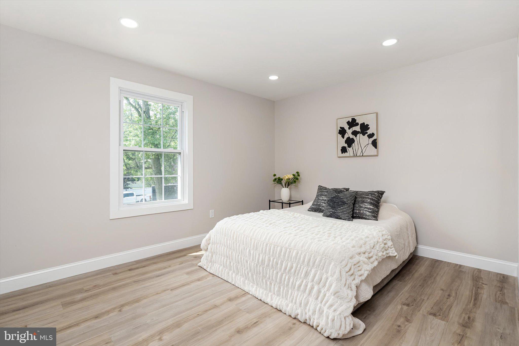 2 Tall Timber Lane Burlington, NJ 08016 - Photo 23 of 30 a bedroom with a bed and a window
