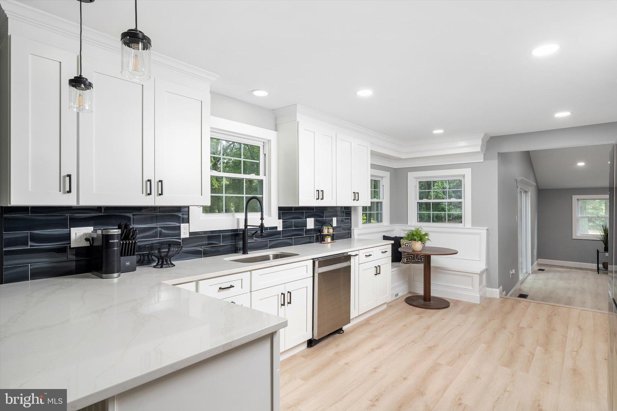 2 Tall Timber Lane Burlington, NJ 08016 - Photo 10 of 30 a kitchen with stainless steel appliances a sink a stove a refrigerator and cabinets
