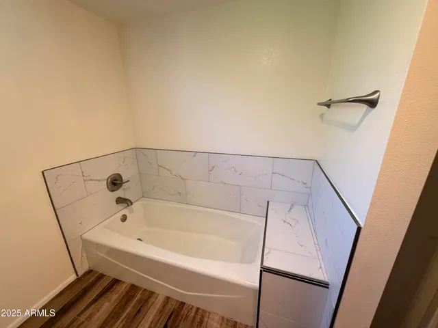 a bathroom with a bathtub