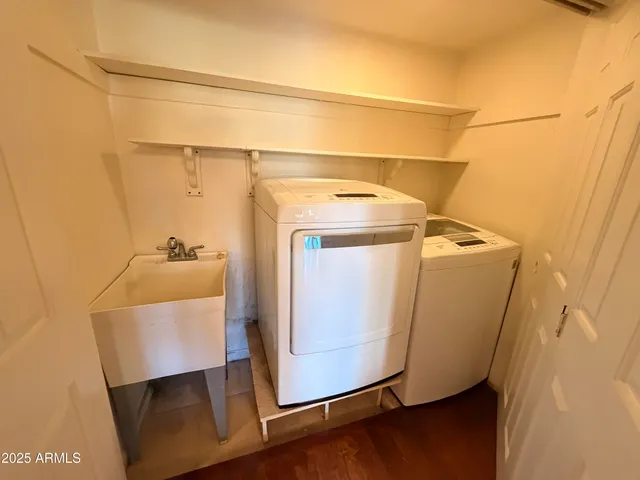 a utility room with dryer and washer
