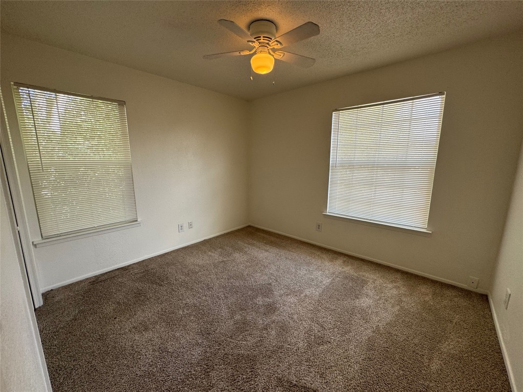 4810 West Wind Trail, Unit 101 Austin, TX 78745 - Photo 13 of 21 an empty room with a window