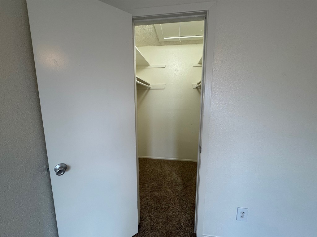 4810 West Wind Trail, Unit 101 Austin, TX 78745 - Photo 17 of 21 a bathroom with a glass shower door