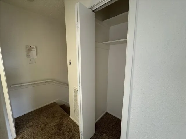 a view of small space with racks on the wall