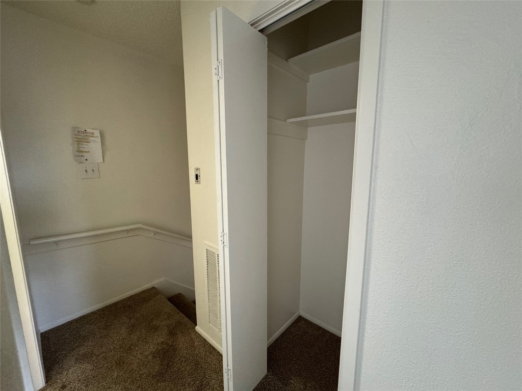 4810 West Wind Trail, Unit 101 Austin, TX 78745 - Photo 18 of 21 a view of small space with racks on the wall