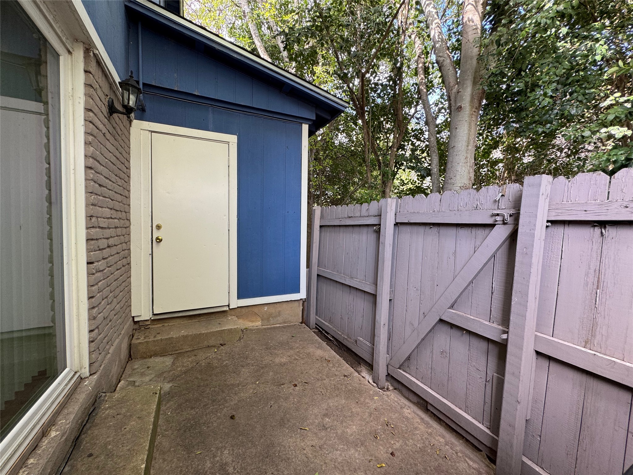 4810 West Wind Trail, Unit 101 Austin, TX 78745 - Photo 20 of 21 a view of a house with a wooden fence