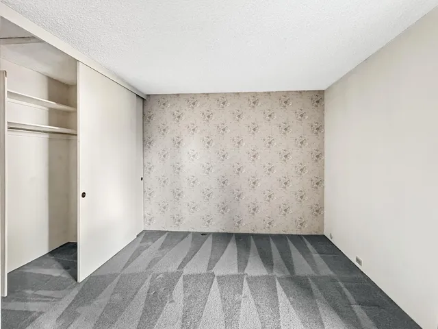 a view of a bathroom from the hallway