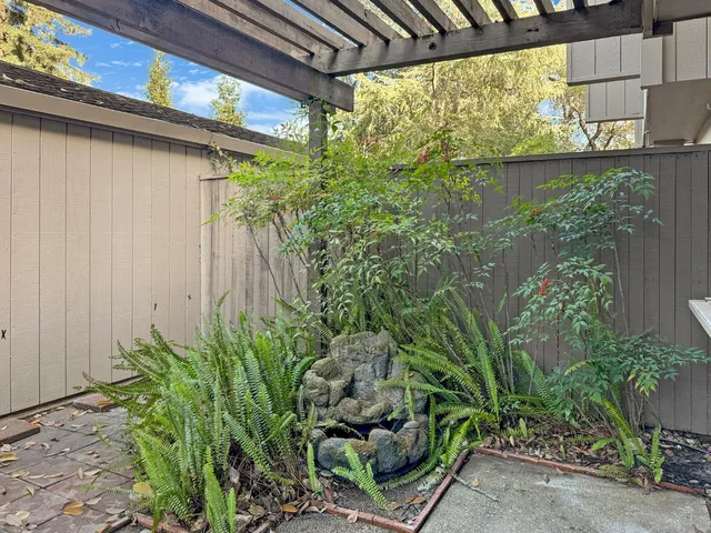 a view of a room with a tree