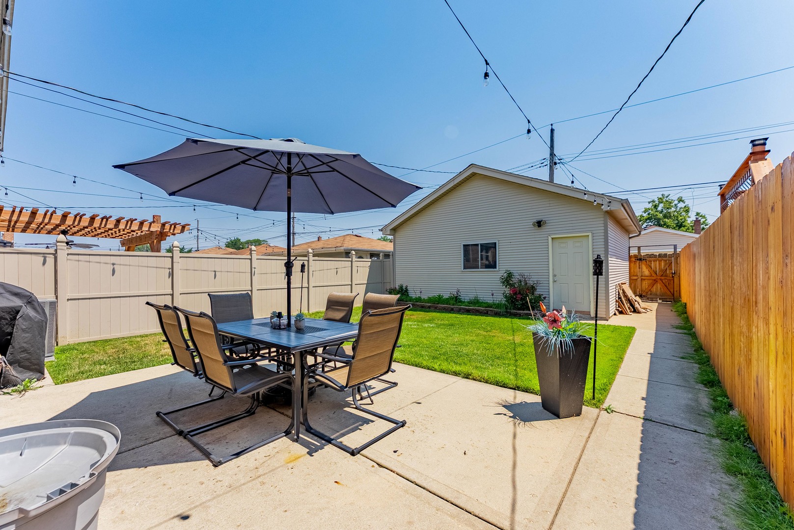 6031 South Normandy Avenue Chicago, IL 60638 - Photo 22 of 26 a view of backyard with seating and green space