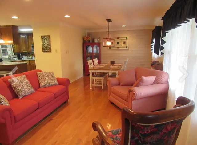 a view of entryway with wooden floor