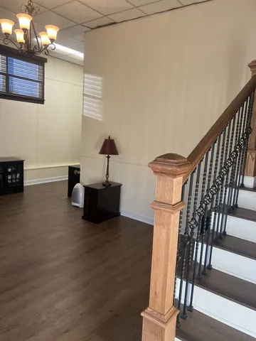 a view of livingroom with furniture and floor to ceiling window