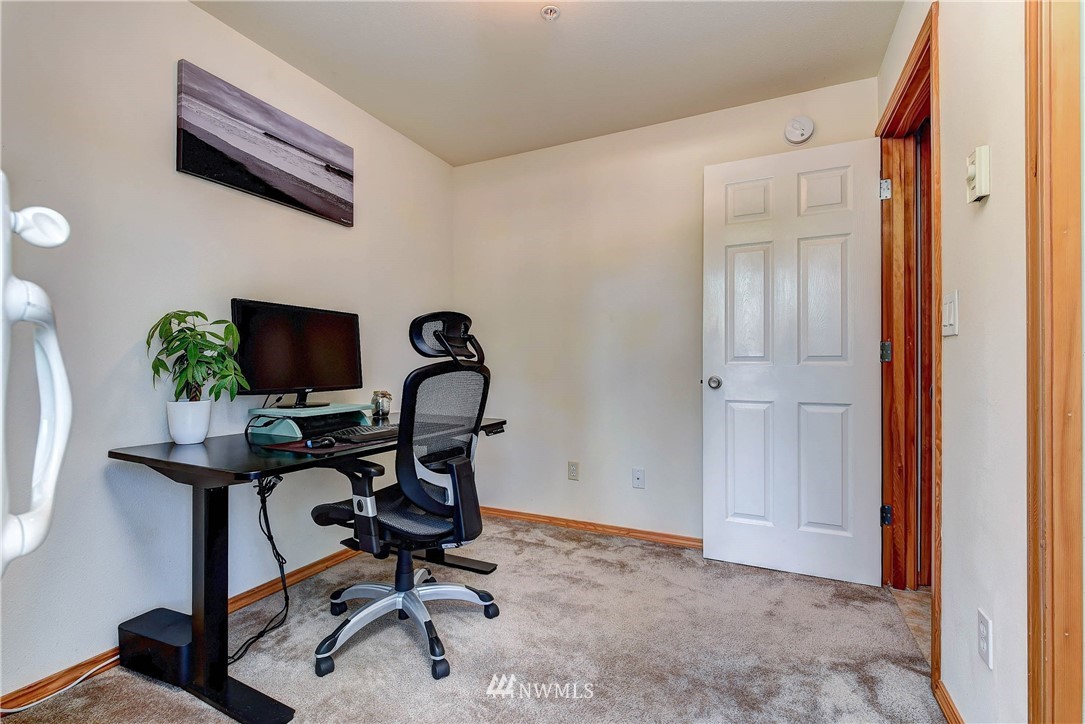 1311 North 145th Street, Unit B Seattle, WA 98133 - Photo 23 of 31 a view of a workspace with furniture