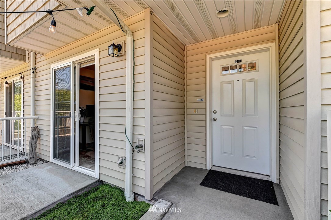 1311 North 145th Street, Unit B Seattle, WA 98133 - Photo 27 of 31 a view of front door and utility room