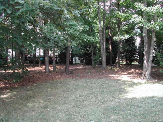 2505 Clerestory Place Raleigh, NC 27615 - Photo 10 of 10 a view of outdoor space with trees