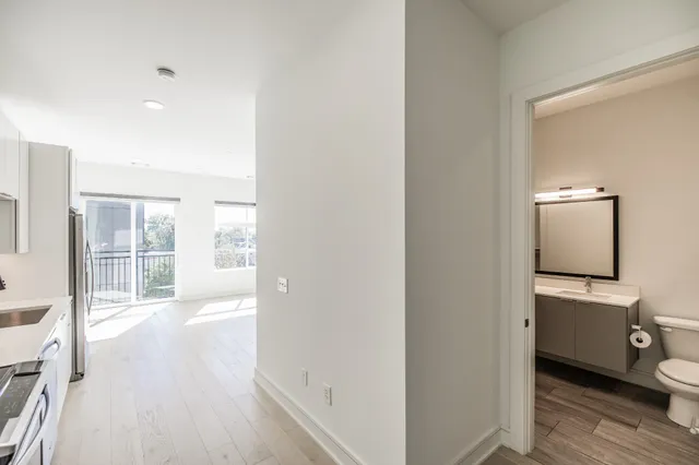 a view of a kitchen with storage and utility