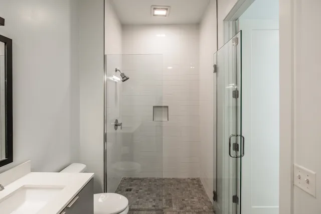 a bathroom with a sink and toilet