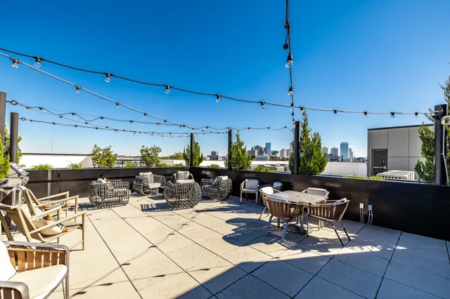 a living room with lots of furniture and appliances