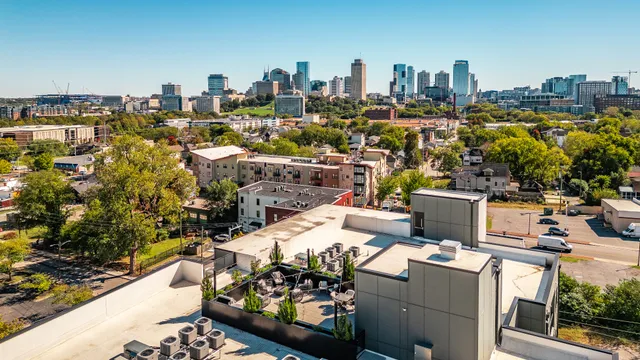 an aerial view of a city with lots of residential buildings