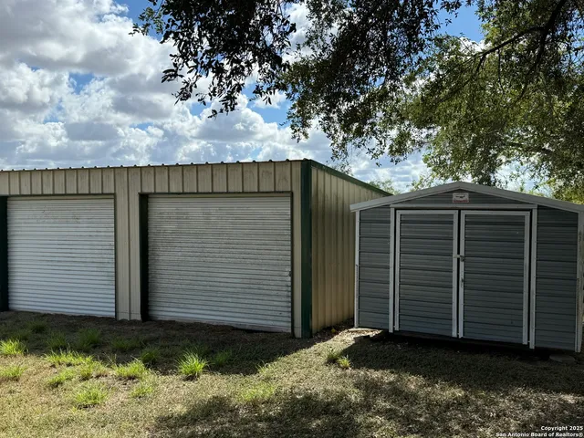a view of a house with a garage