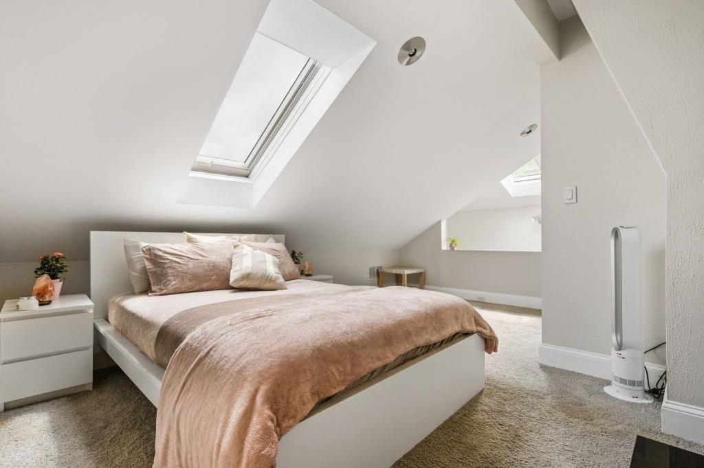 2840 Peachtree Road, Unit 503 Atlanta, GA 30305 - Photo 35 of 46 a bedroom with a bed and a window