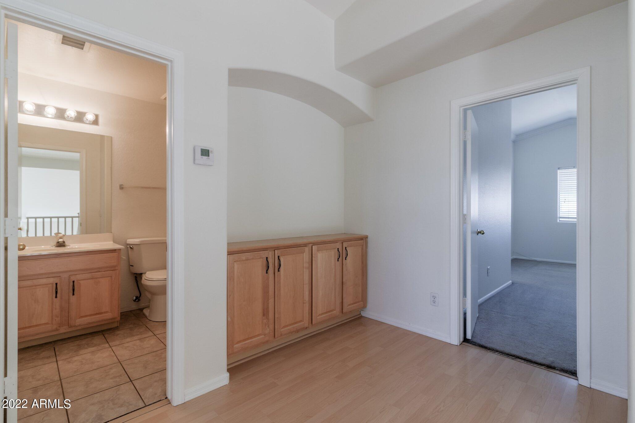 16784 West Southampton Road Surprise, AZ 85374 - Photo 28 of 33 Hall with Extra Storage