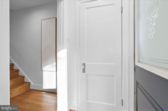 a view of entryway with wooden floor