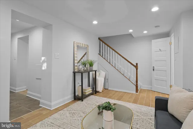 a living room with furniture and a table