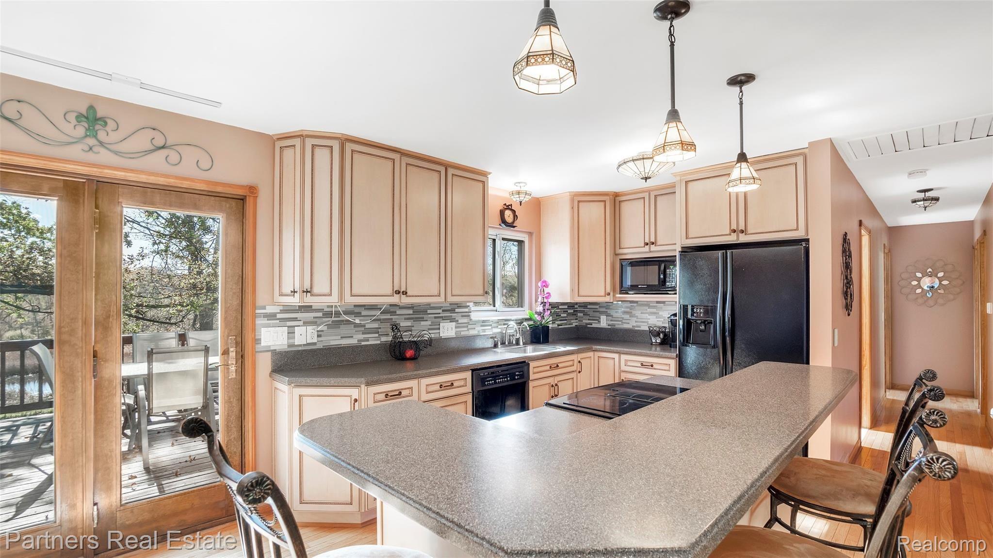 3978 East Coon Lake Road Howell, MI 48843 - Photo 10 of 37 3978-E-Coon-Lake-Rd-Windowstill-Real-Estate-Photography-18.jpg