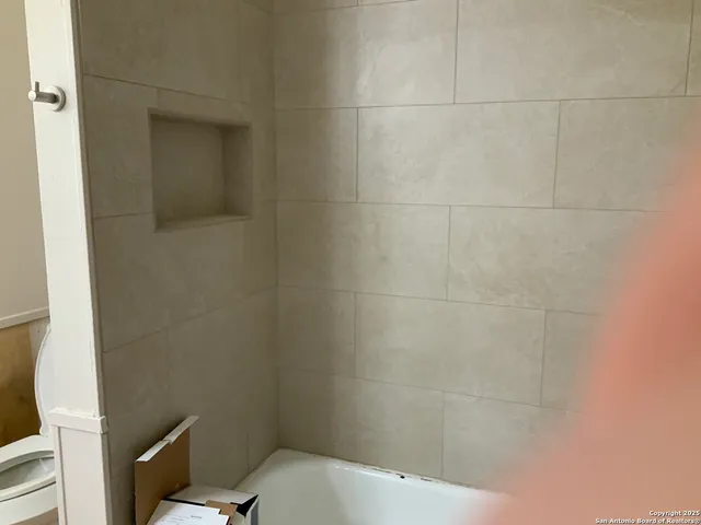 a bathroom with a sink and toilet