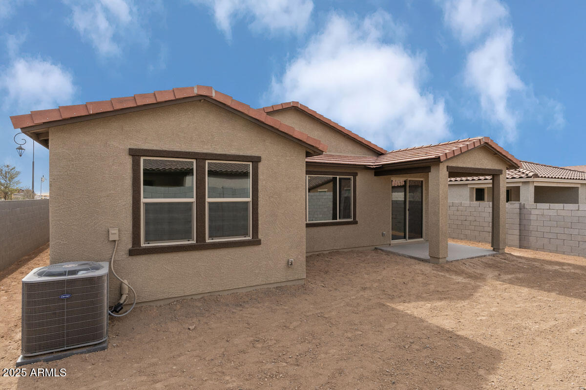 18168 West Pima Street Goodyear, AZ 85338 - Photo 21 of 21 a view of a house with a yard