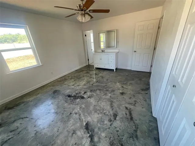 a view of pathway with yard