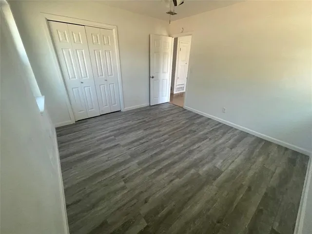 a view of a swimming pool with an outdoor space and seating area