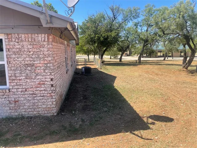 a view of swimming pool with a patio