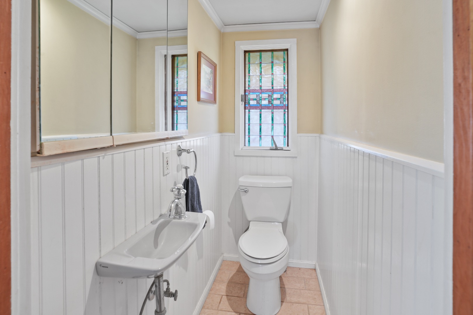 101 Tradewinds Road Oak Bluffs, MA 02557 - Photo 15 of 59 a bathroom with a toilet a sink and a window