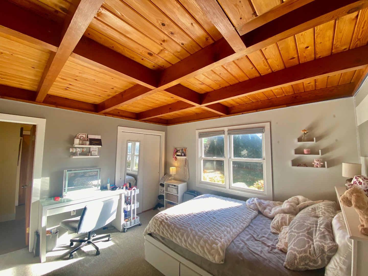 101 Tradewinds Road Oak Bluffs, MA 02557 - Photo 25 of 59 a bedroom with a bed and wooden floor