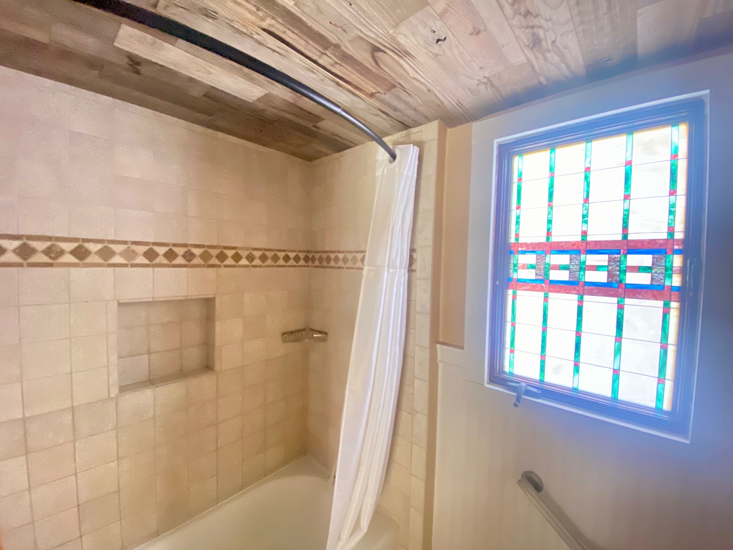 101 Tradewinds Road Oak Bluffs, MA 02557 - Photo 26 of 59 a bathroom with a shower and a bathtub