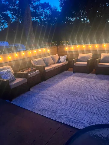 a view of yard with swimming pool