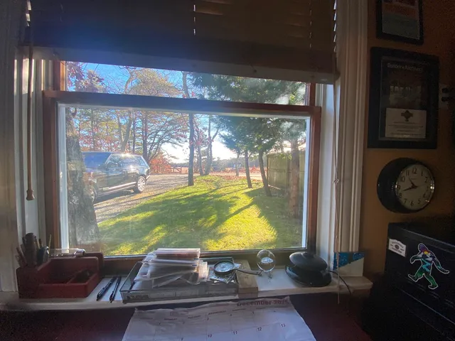 a view of swimming pool from a yard