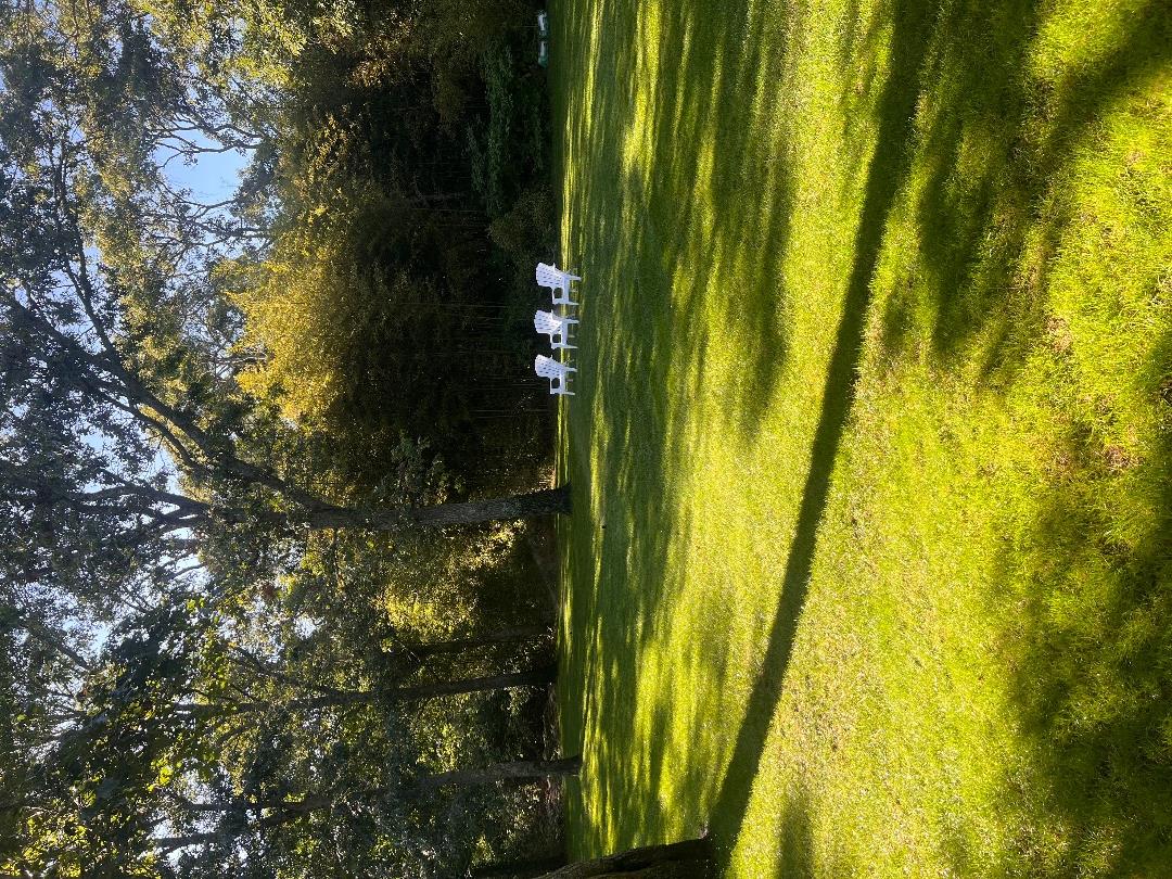 101 Tradewinds Road Oak Bluffs, MA 02557 - Photo 56 of 59 a view of a swimming pool with an outdoor space and seating area