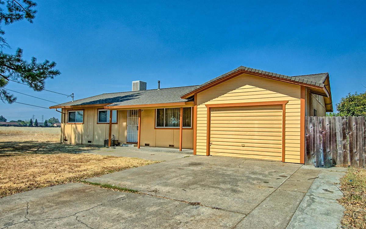 20458 Womack Road Red Bluff, CA 96080 - Photo 1 of 20 a front view of a house with a yard