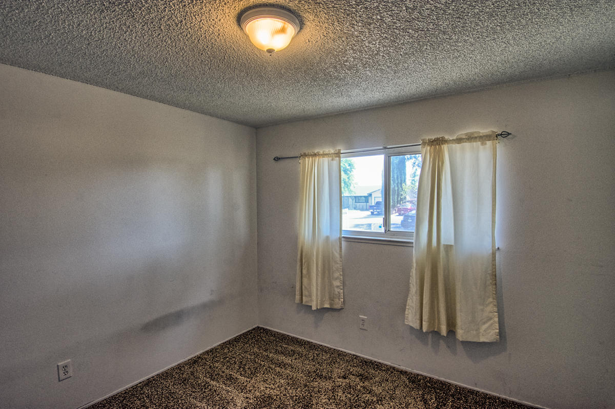 20458 Womack Road Red Bluff, CA 96080 - Photo 15 of 20 an empty room with a window