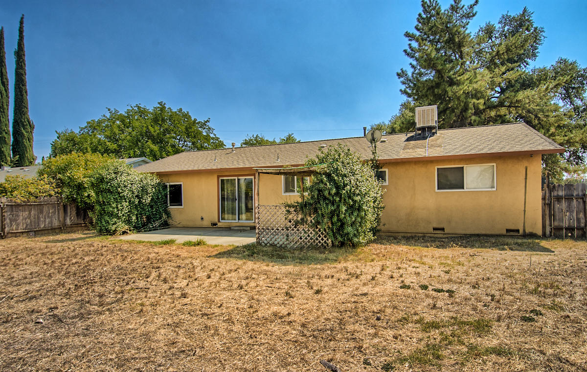 20458 Womack Road Red Bluff, CA 96080 - Photo 17 of 20 a front view of a house with a yard