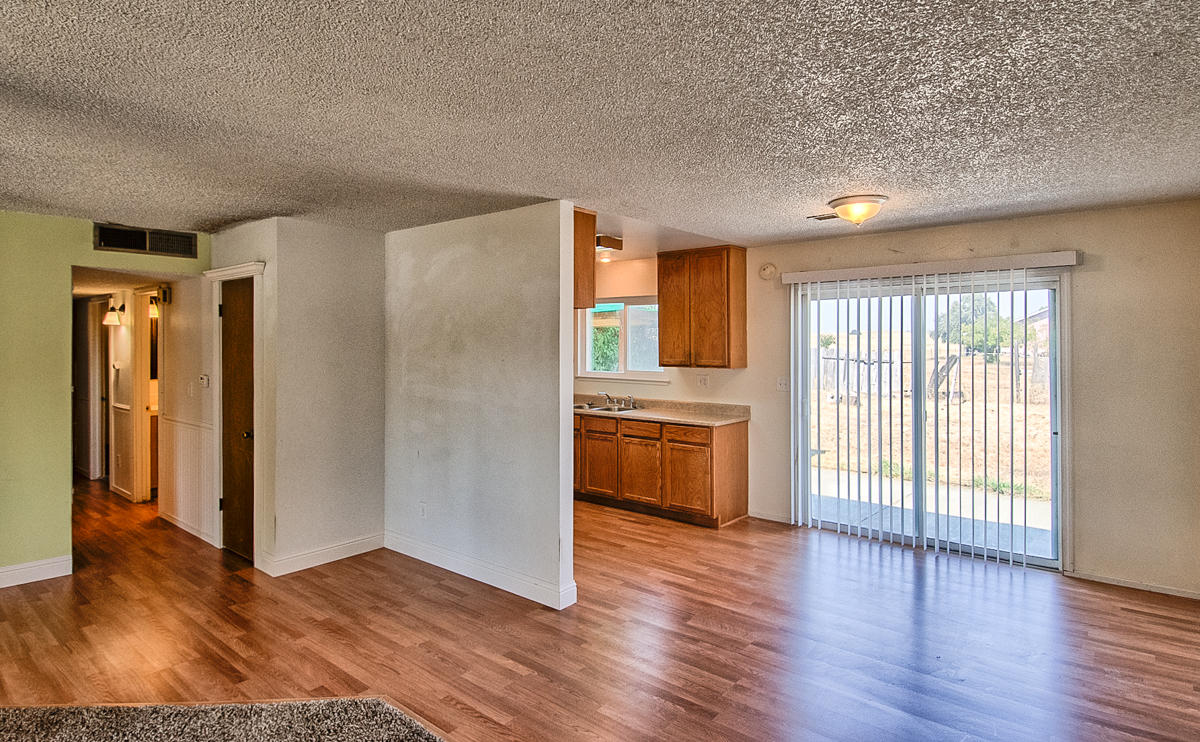 20458 Womack Road Red Bluff, CA 96080 - Photo 4 of 20 a view of a kitchen with wooden floor and electronic appliances