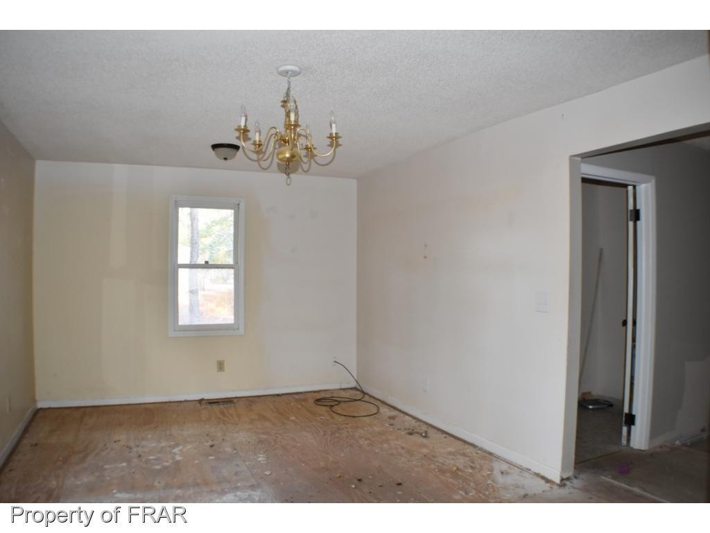 216 R Sands Road Carthage, NC 28327 - Photo 11 of 28 a view of a livingroom with a window