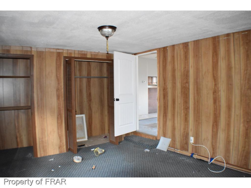 216 R Sands Road Carthage, NC 28327 - Photo 18 of 28 a view of entryway with wooden floor