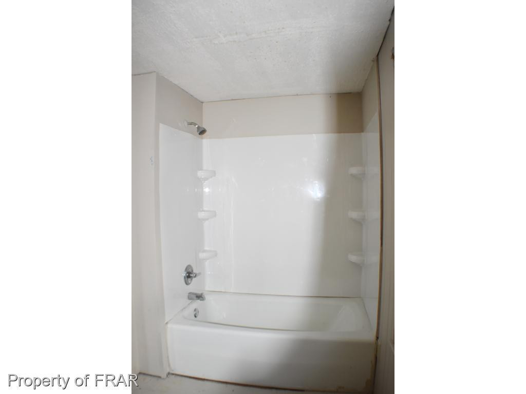 216 R Sands Road Carthage, NC 28327 - Photo 21 of 28 a bathroom with a shower