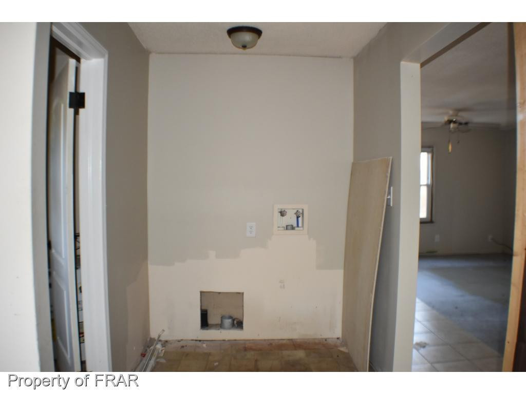 216 R Sands Road Carthage, NC 28327 - Photo 8 of 28 a view of a hallway with wooden floor