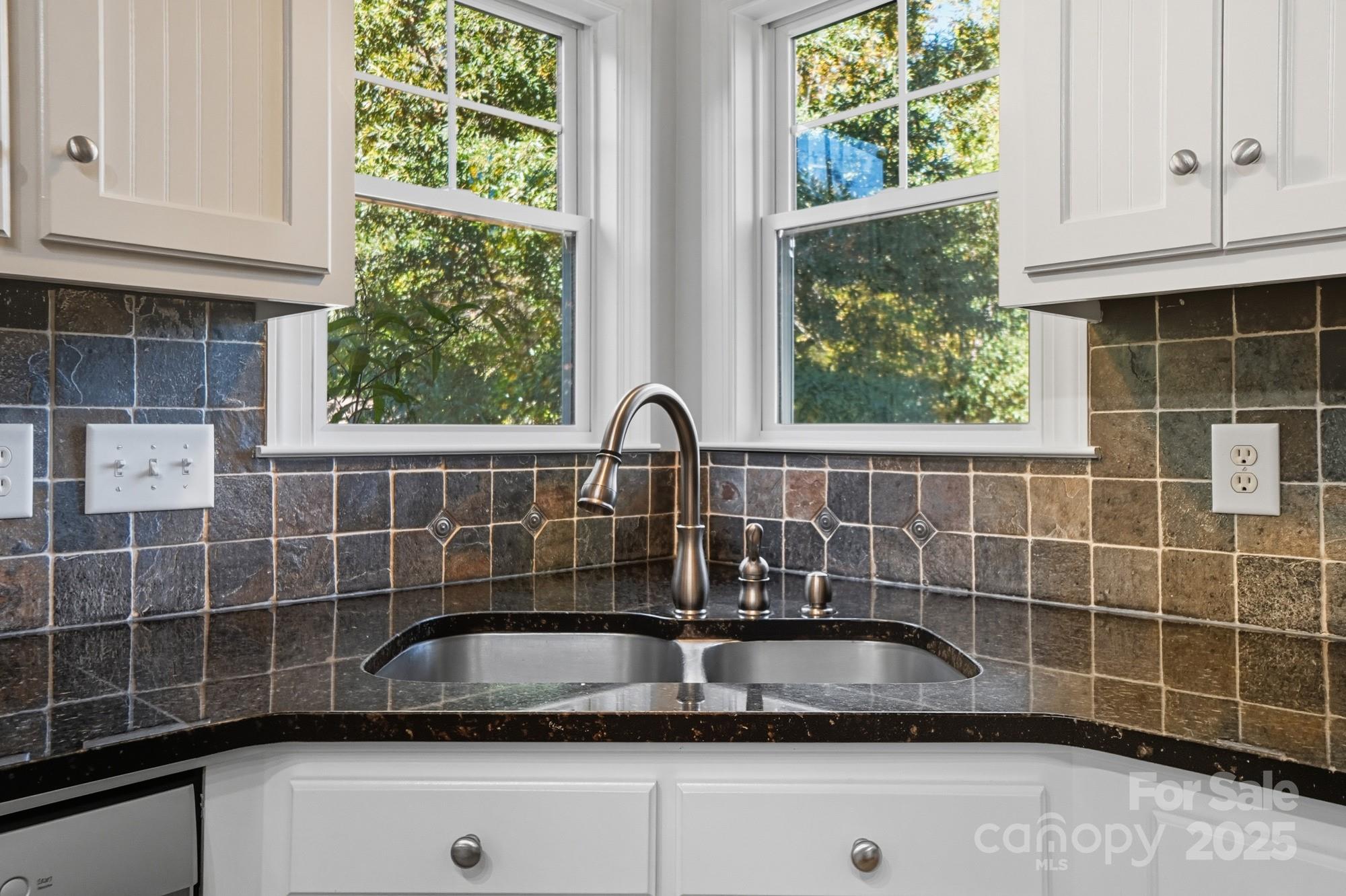 3633 Creek Ridge Drive Denver, NC 28037 - Photo 15 of 47 a kitchen with a sink and a window