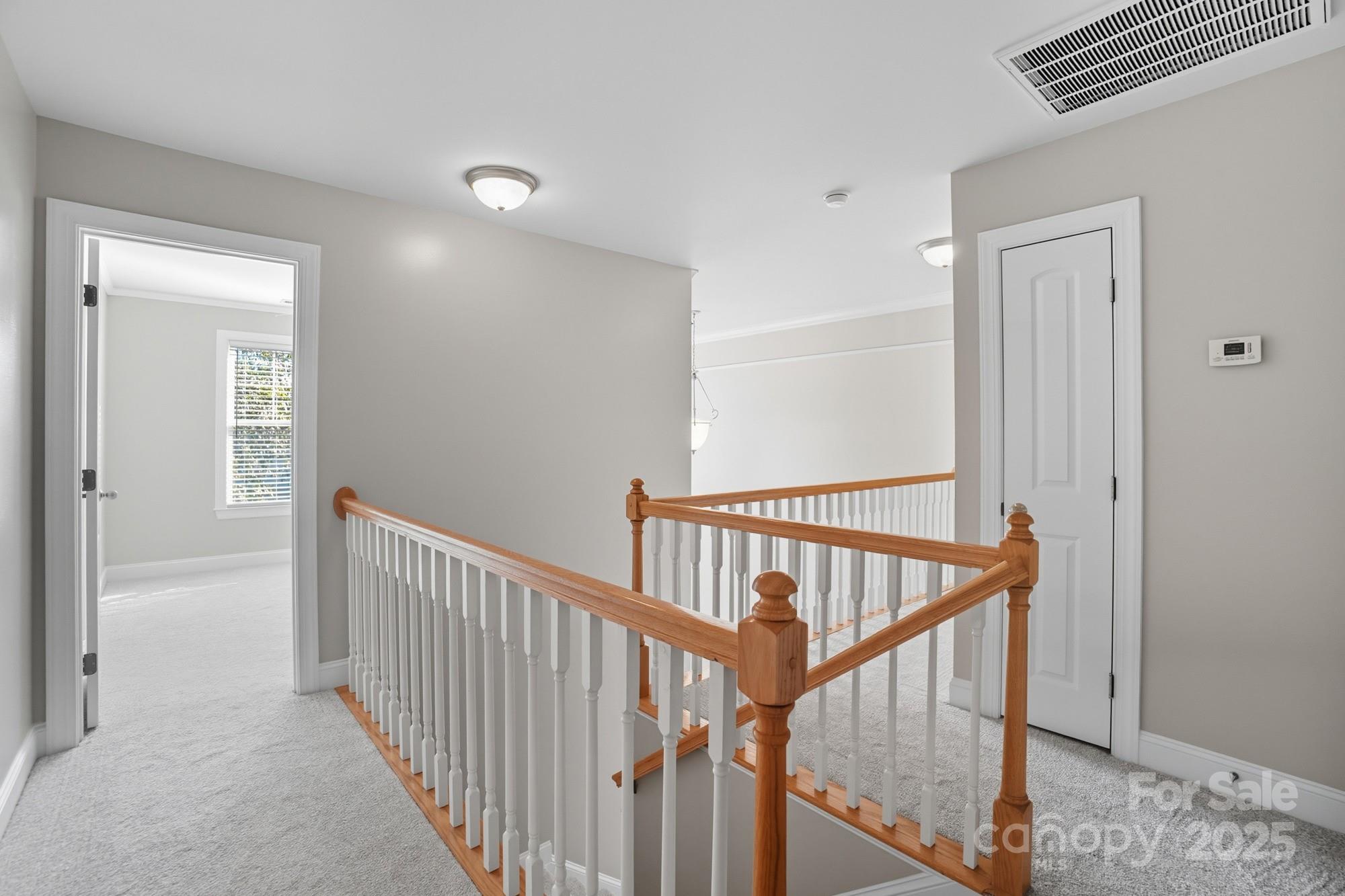 3633 Creek Ridge Drive Denver, NC 28037 - Photo 21 of 47 a view of a hallway with staircase